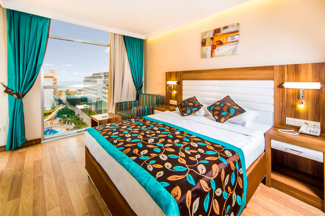 Hotel Dizalya Palm Garden - przykładowy pokój standardowy z łóżkiem małżeńskim