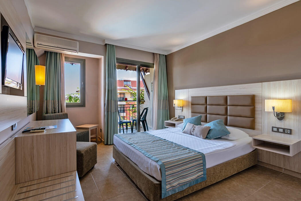 Palmeras Beach Hotel - łóżko w pokoju standardowym                        