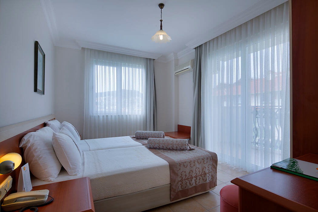 Hotel Villa Sunflower Aparts & Suites - sypialnia w pokoju rodzinnym