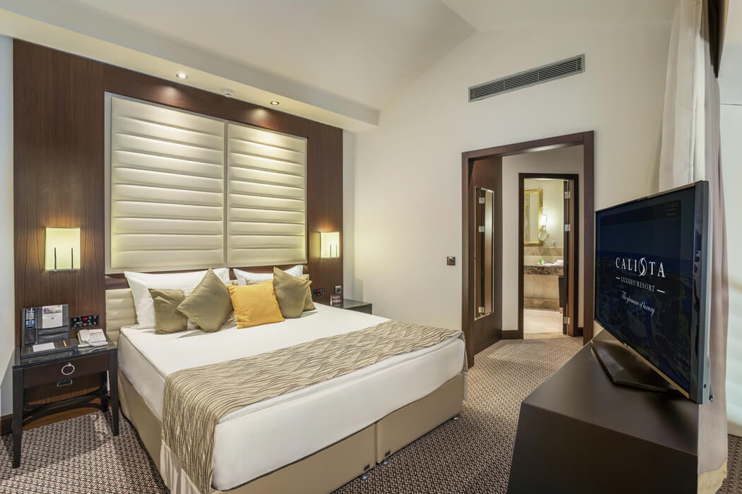 Hotel Calista Luxury Resort - sypialnia w pokoju rodzinnym dublex