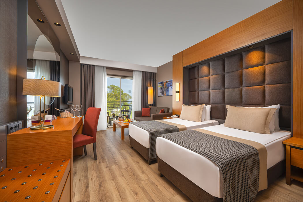 Hotel Seven Seas Gravel Select - dwa łóżka w pokoju standardowym w budynku głównym